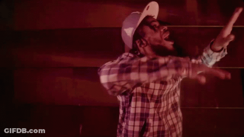 Man In Plaid Shirt And Purple Hat Dancing GIF