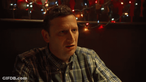 Man In Plaid Shirt And Tie Asking What GIF