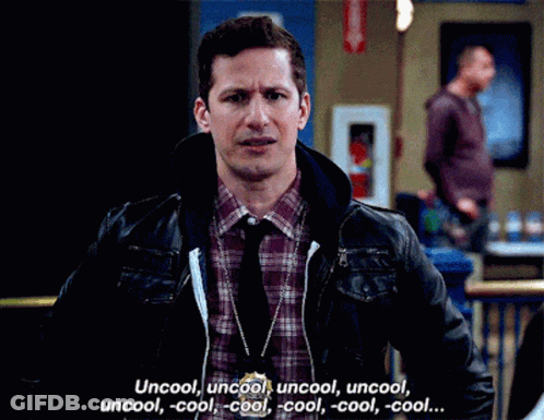 Man In Plaid Shirt And Tie Talking To Woman In Hallway GIF