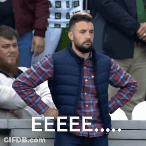 Man In Plaid Shirt And Vest Saying Eeee GIF