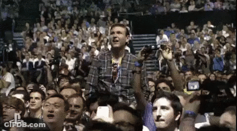 Man In Plaid Shirt At Concert GIF