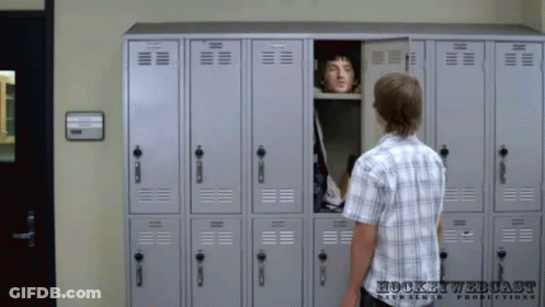 Man In Plaid Shirt At Hockey Webcast Locker GIF