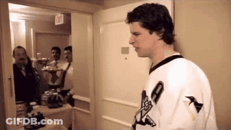 Man In Plaid Shirt At Hockey Webcast Locker GIF