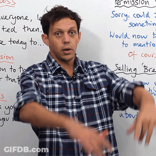 Man In Plaid Shirt At Whiteboard Saying Permission GIF