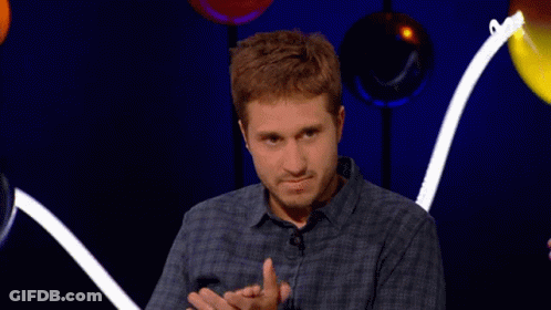 Man In Plaid Shirt Clapping With Balloons GIF