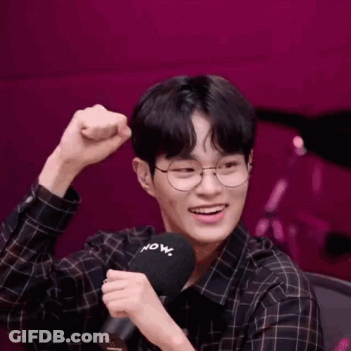 Man In Plaid Shirt Dancing At Microphone Saying Now GIF