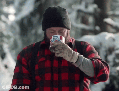 Man In Plaid Shirt Drinking From Dirty Moore Mug GIF