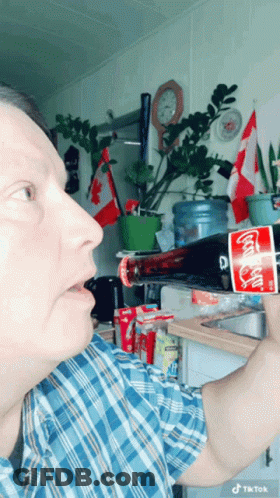 Man In Plaid Shirt Drinks Coca Cola GIF