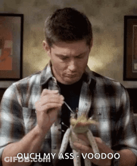 Man In Plaid Shirt Eating Bananas With Fork GIF