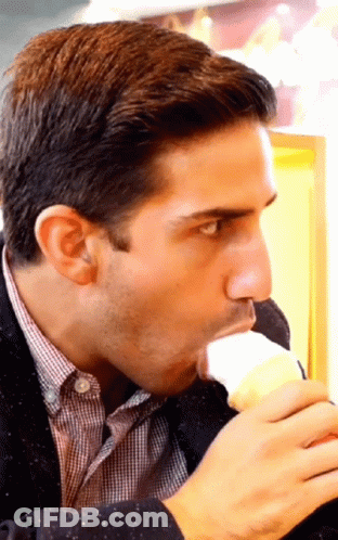 Man In Plaid Shirt Eating Vanilla Ice Cream GIF