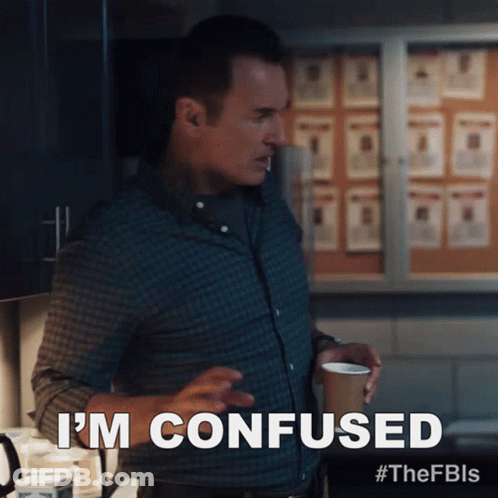 Man In Plaid Shirt Holding Coffee Says I'm Confused GIF