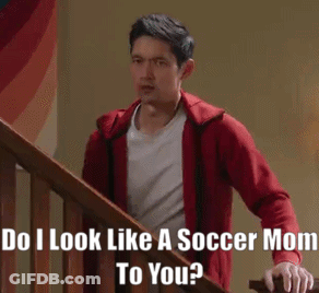 Man In Plaid Shirt Holding Frisbee In Front Of Bing Ad GIF