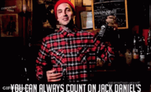 Man In Plaid Shirt Holding Jack Daniel's Whiskey GIF