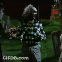 Man In Plaid Shirt In Cemetery GIF