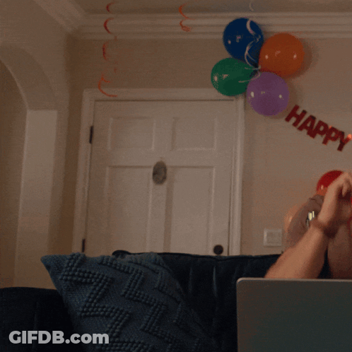Man In Plaid Shirt Jumping With Surprise GIF