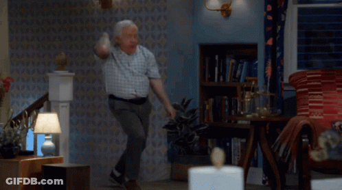 Man In Plaid Shirt Jumping GIF