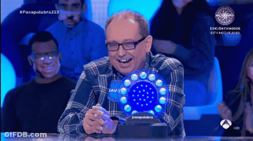 Man In Plaid Shirt Laughing Holding Blue Javi Object GIF