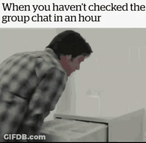 Man In Plaid Shirt Looking Into Filing Cabinet When You Haven't Checked The Group Chat GIF
