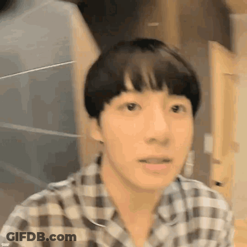 Man In Plaid Shirt Making Funny Face GIF