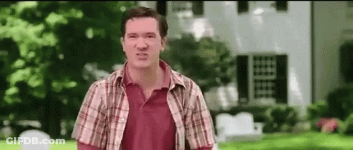 Man In Plaid Shirt Making Funny Face GIF