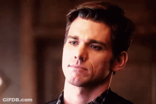 Man In Plaid Shirt Making Funny Face GIF