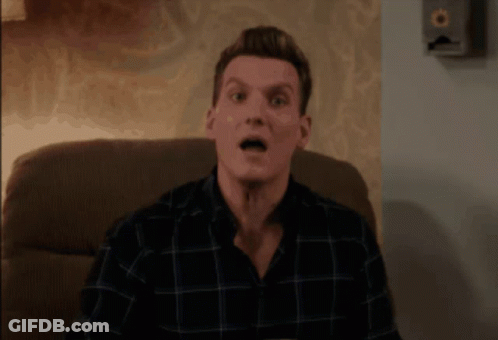 Man In Plaid Shirt Making Surprised Face GIF