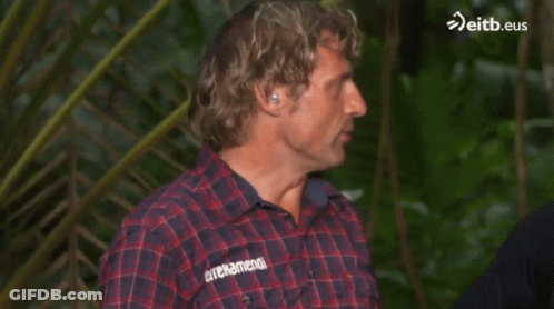 Man In Plaid Shirt Near Palm Tree Eitb.eus GIF