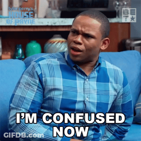 Man In Plaid Shirt On Blue Couch Says I'm Confused Now GIF