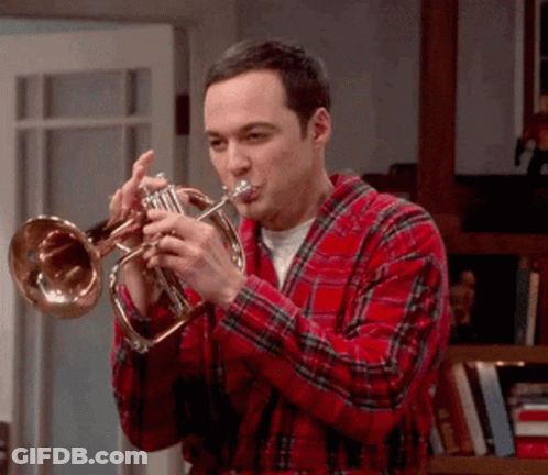 Man In Plaid Shirt Playing Trumpet GIF