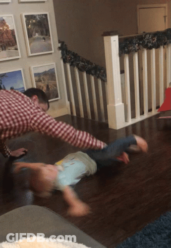 Man In Plaid Shirt Playing With Child GIF