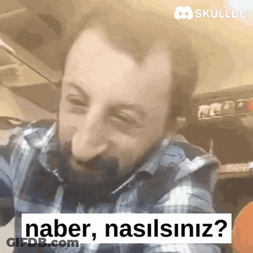 Man In Plaid Shirt Saying Haber Nasilsiniz In Front Of Skulldc Logo GIF