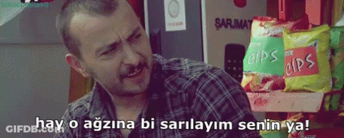 Man In Plaid Shirt Saying Hay O Agzina Bi Sarilayim Senin Ya GIF