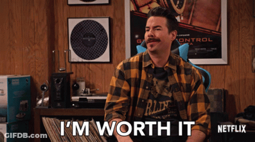 Man In Plaid Shirt Saying I'm Worth It In Front Of Netflix Sign GIF
