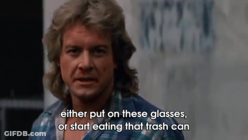 Man In Plaid Shirt Saying Put On Glasses Or Eat Trash Can GIF