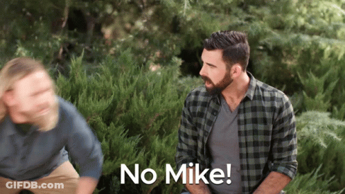 Man In Plaid Shirt Says No Mike GIF