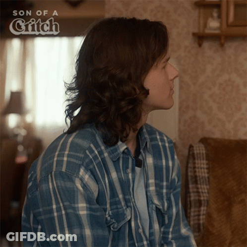 Man In Plaid Shirt Sitting On Couch Son Of A Gritch GIF