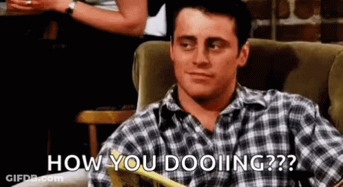 Man In Plaid Shirt Sitting On Couch GIF