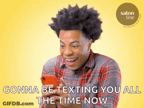 Man In Plaid Shirt Smiling At Phone Gonna Be Texting You All The Time Now GIF