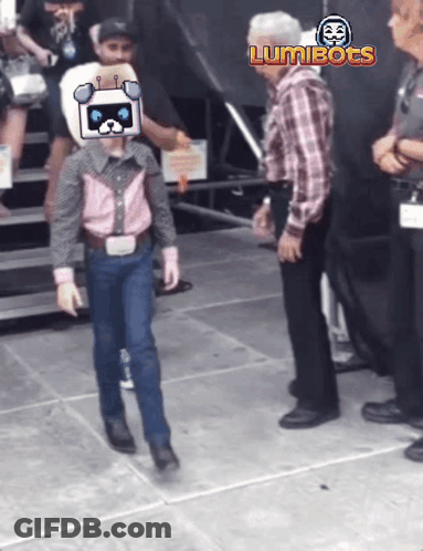Man In Plaid Shirt Standing Before Luminbots Sign GIF