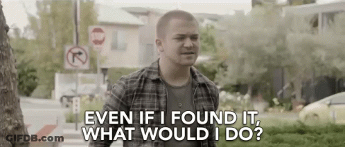 Man In Plaid Shirt Standing By Stop Sign And Tree GIF