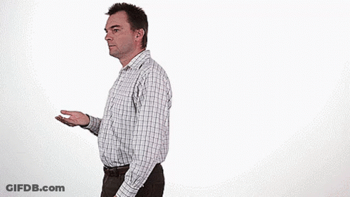 Man In Plaid Shirt Standing GIF