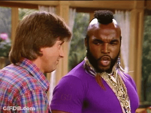Man In Plaid Shirt Standing Next To Man In Purple Shirt GIF
