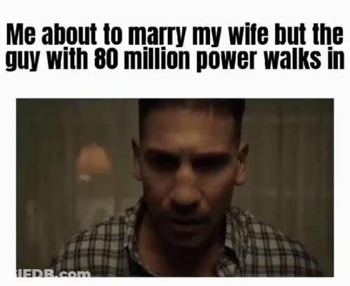 Man In Plaid Shirt Talking About Marrying Wife While Guy With 80 Million Power Walks In GIF