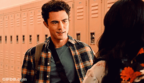 Man In Plaid Shirt Talking To Woman GIF