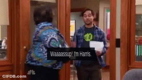 Man In Plaid Shirt Talking To Woman In Blue GIF