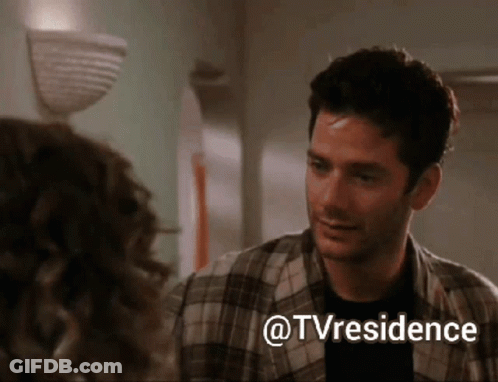 Man In Plaid Shirt Talks To Woman In Hallway @Tvresidence GIF