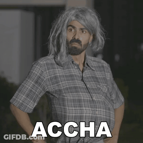 Man In Plaid Shirt With Accha On Chest GIF
