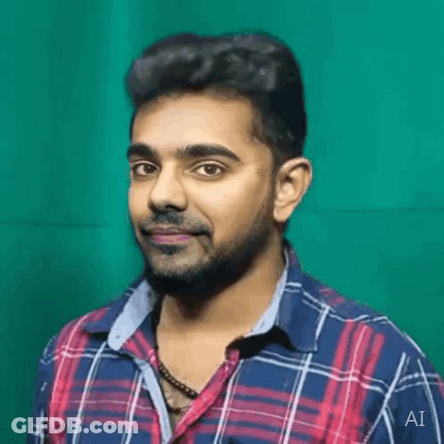 Man In Plaid Shirt With AI On Sleeve GIF