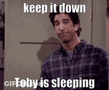 Man In Plaid Shirt With Caption Keep It Down Toby Is Sleeping GIF