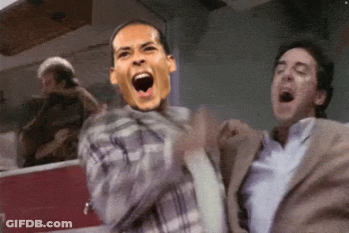Man In Plaid Shirt With Face On Back GIF